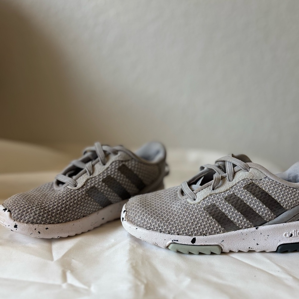 Adidas Light Gray sneakers
Small stain on back left shoe 
name on the inside
